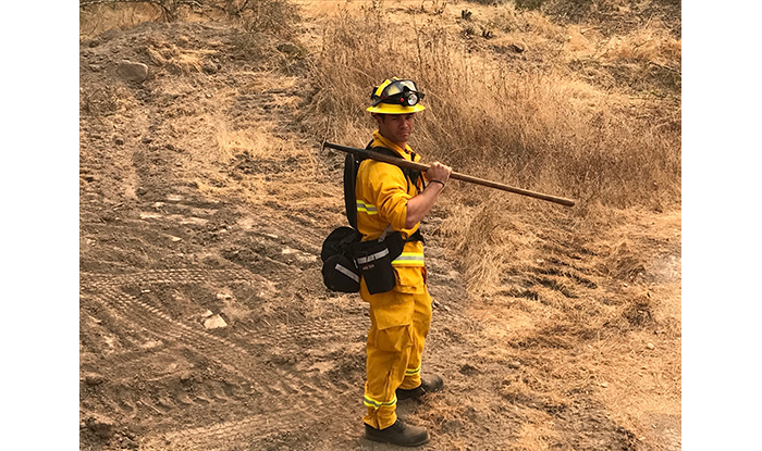Firefighter in a Field