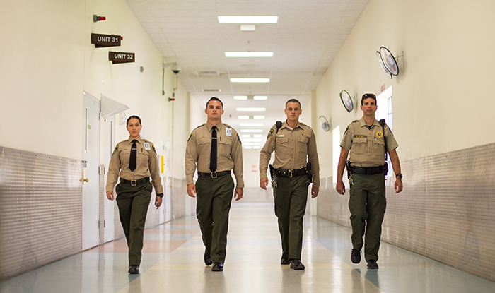 Police Officers in Hallway